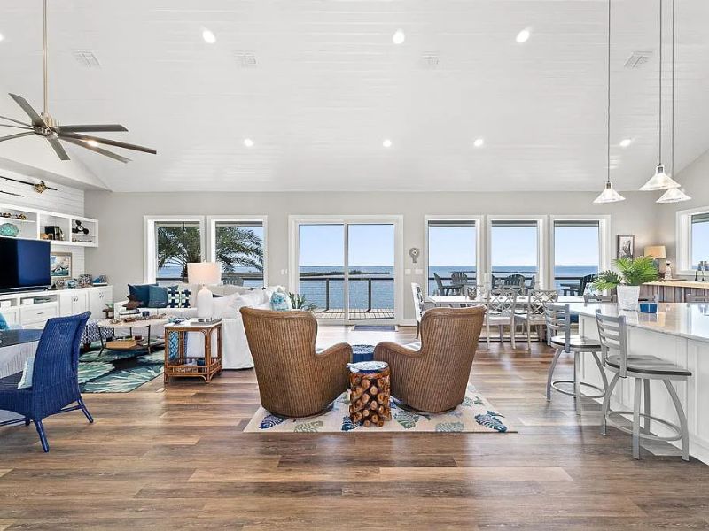 Interior view of bayfront home in Rockport, TX with coastal inspired interior design and open kitchen floorplan